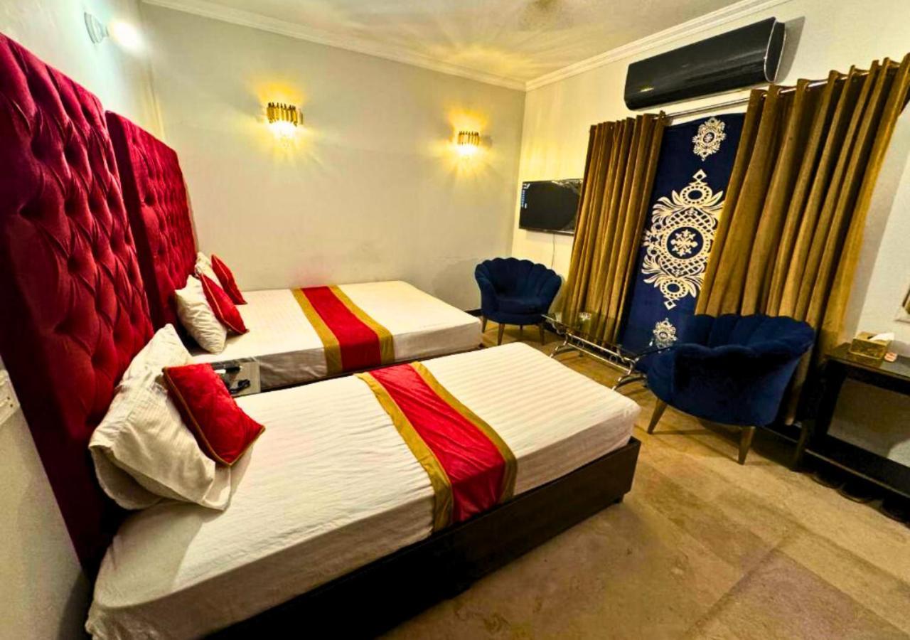 Doves Inn Hotel Kalma Chowk ラホール エクステリア 写真